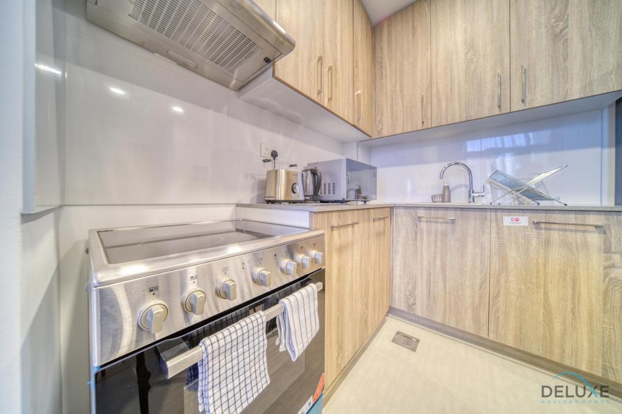 Sophisticated 1Br At Town Square Rawda Dubailand By Deluxe Holiday Homes Bagian luar foto